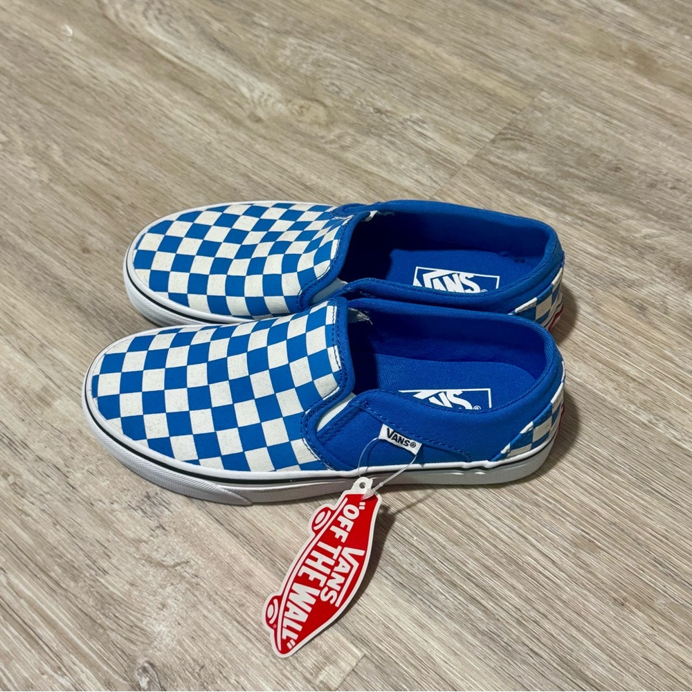 Brand new vans slip on. Blue checkerboard pattern